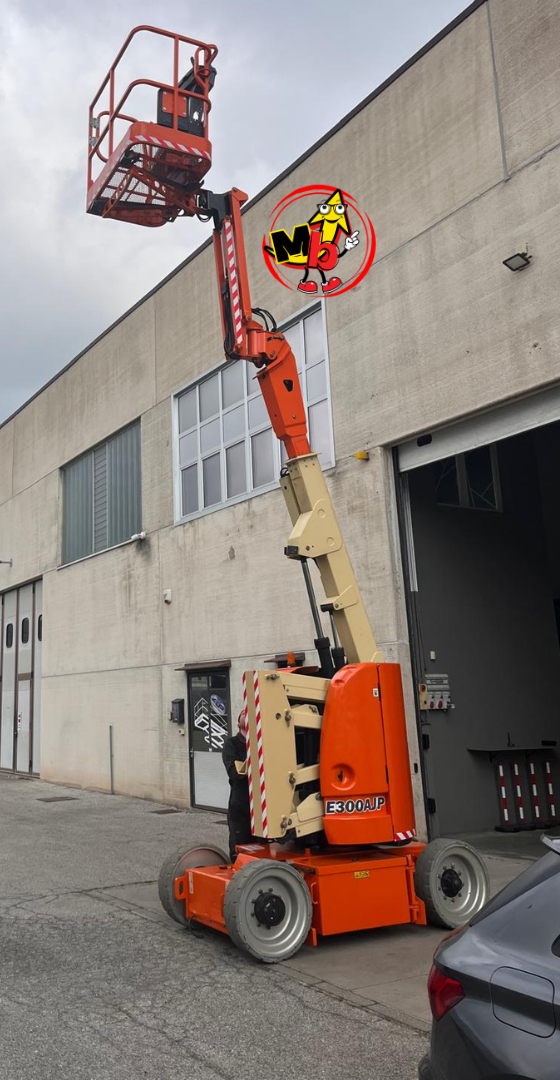JLG 300 plataforma de tijera eléctrica de segunda mano en buen estado